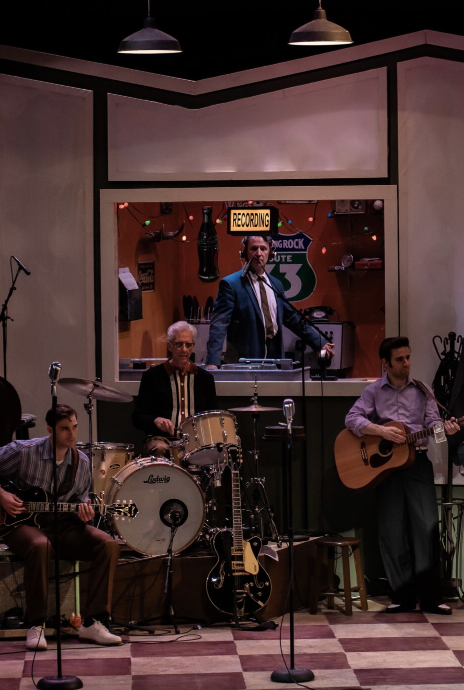 As Sam Phillips with Benjamin Nurthen as Carl Perkins, David Sonneborn as Fluke, and Joe Boover as Elvis Presley in MILLION DOLLAR QUARTET at Arrow Rock Lyceum Theatre. Photo by Ryan J. Zirngibl.